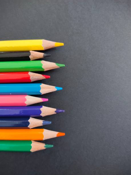 istock Colorful pencils on a black background 1469482852