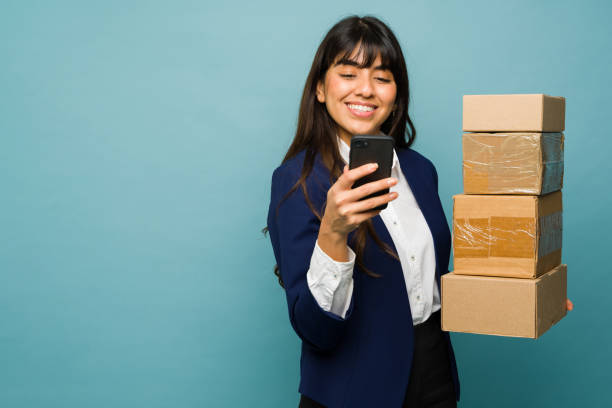 istock Beautiful businesswoman working carrying packages 1469482908