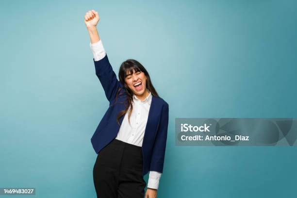 Excited Professional Woman Looking Confident Stock Photo - Download Image Now - Businesswoman, Celebration, Mexico
