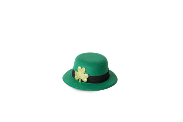 istock green irish leprechaun hat with gold clover isolated, saint patrick day background 1469483134