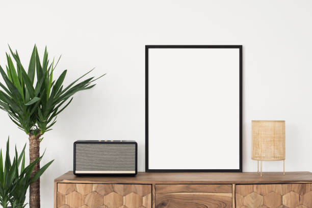istock Artwork mockup in interior design. Blank picture frame on a wall. Vertical orientation 1469483254