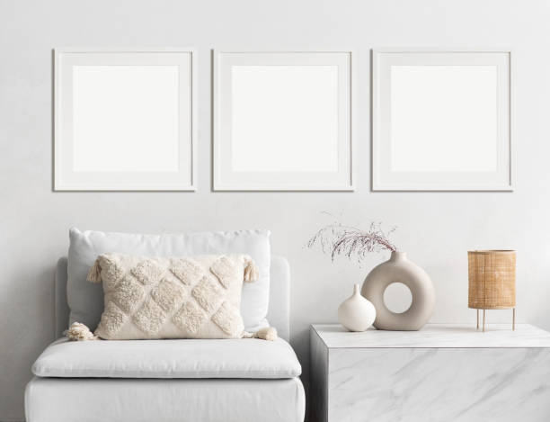istock Three blank white square picture frames on a wall. Artwork mocks-up 1469483269