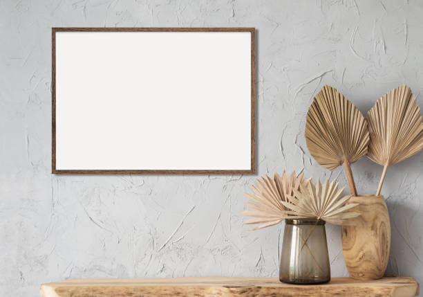 istock Artwork mockup in interior design. Blank picture frame on a wall. Horizontal orientation 1469483280