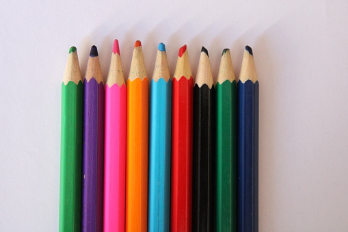color pencils on a white background