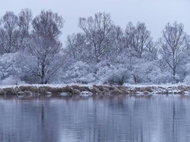 istock River bank in winter frozen scenery 1469484618