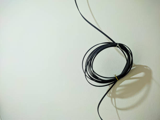istock telephone wire hanging on the wall 1469486050