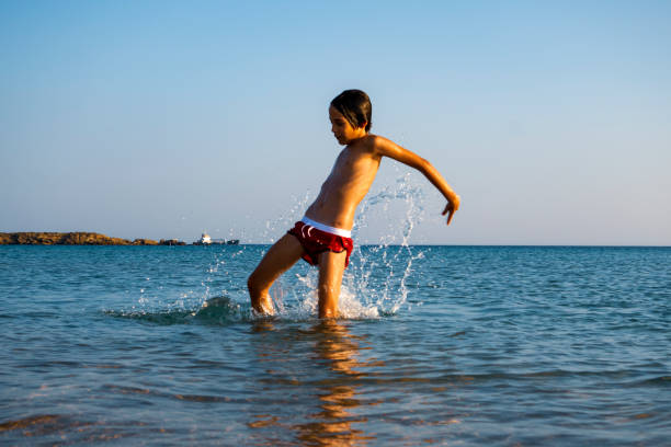 istock Boy Summer fun on the sea 1469486105
