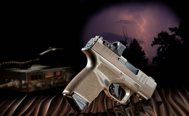 istock Lightning strike behind a ham radio and firearm 1469487836