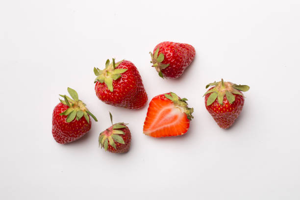 istock Fresh strawberries on white background, top view 1469488442
