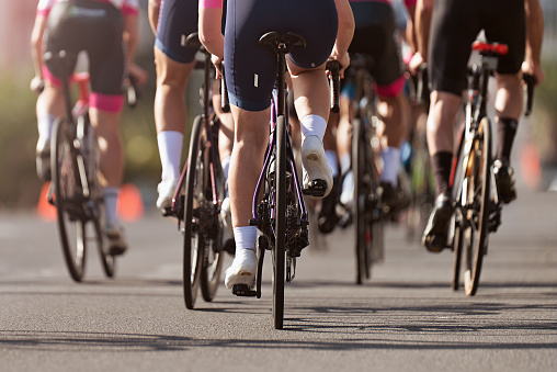 Cycling competition, cyclist athletes riding a race