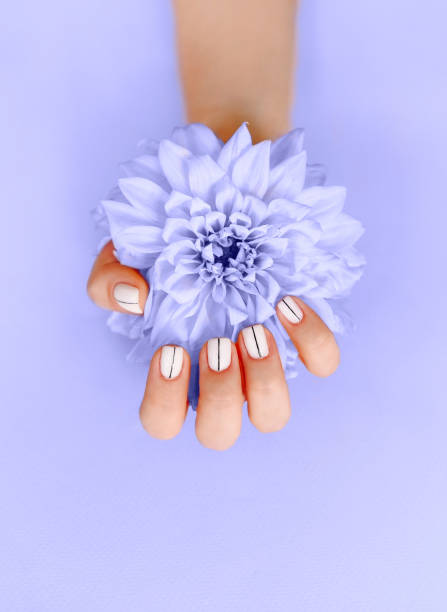 istock Woman with manicure and flower 1469496768