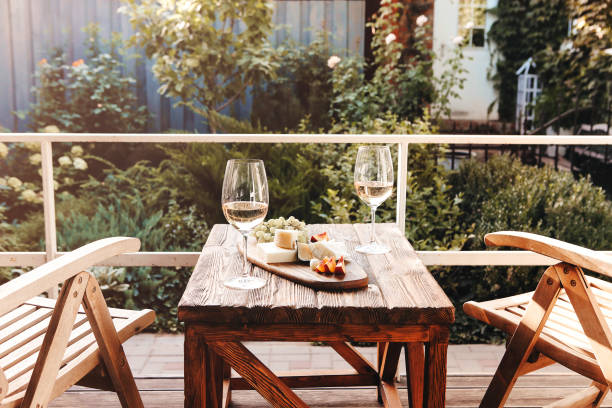 istock Table with wine and food on balcony 1469497644