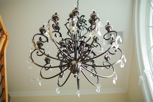 Chandelier hanging at home showing decoration of glass and metal
