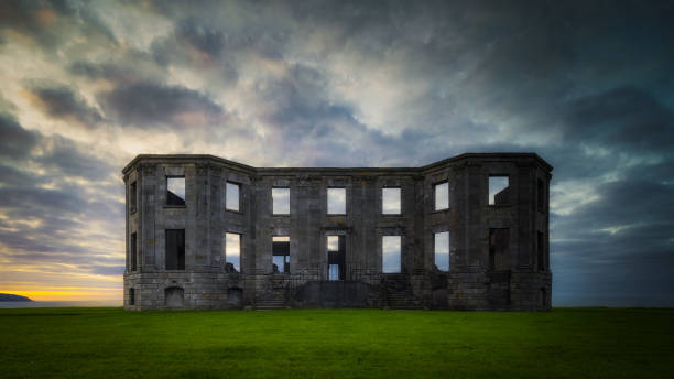 ruins of downhill demesne with dramatic, moody sunset, northern ireland - national trust northern ireland uk rock imagens e fotografias de stock