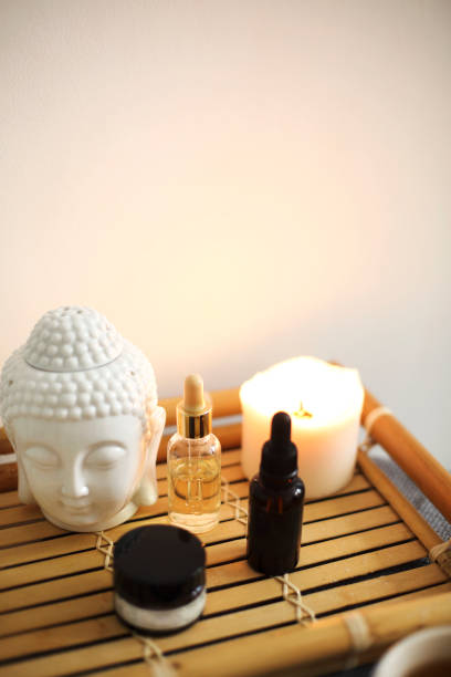 istock Candles and skincare products on table 1469506826