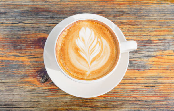 istock Coffee Artistry: Top-View of a Latte with Intricate Design 1469508028