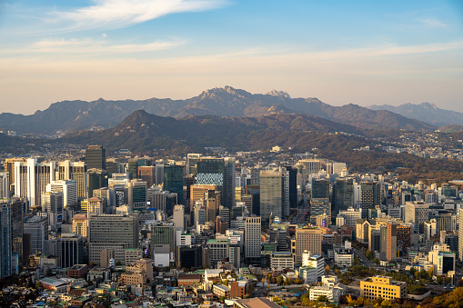 Aerial view of the capital city of Seoul in South Korea, seen at sunset.