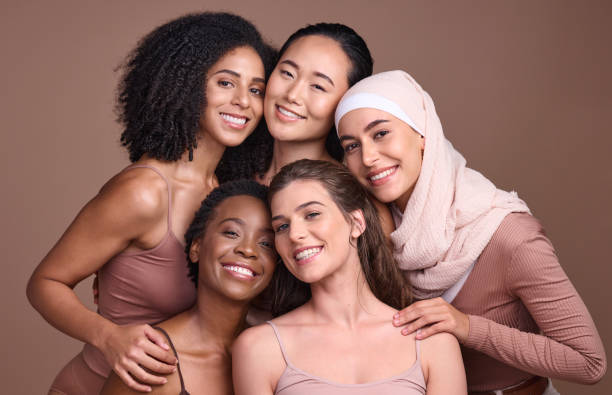 istock Women, faces or diversity on studio background in empowerment trust, solidarity support or community self love. Portrait, smile or group beauty models, happy facial expression or religion acceptance 1469516029