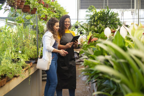istock Owner and client in a flower shop 1469516738