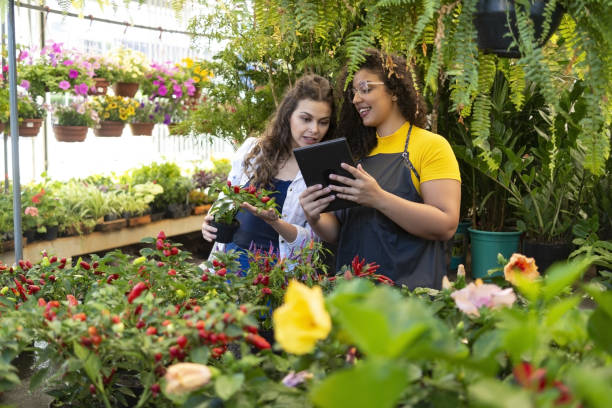 istock Owner and client in a flower shop 1469517650