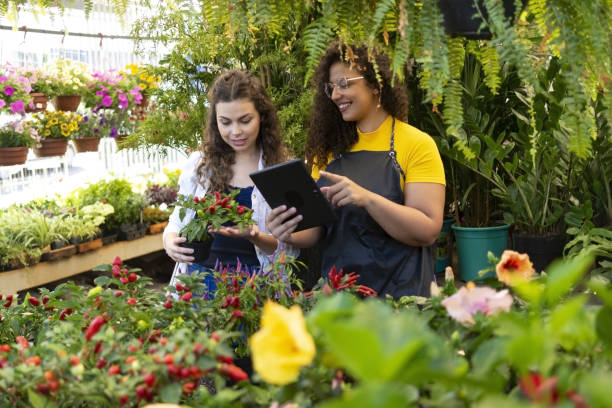 istock Owner and client in a flower shop 1469517730