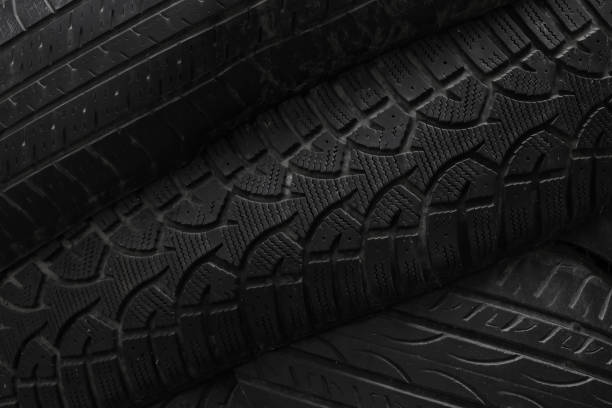 istock Black wheel tires background 1469517863