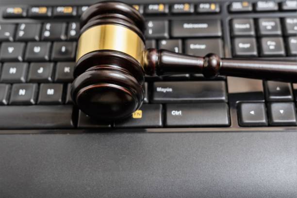 istock Cyber law or justice concept, judge gavel on computer keyboard 1469519192