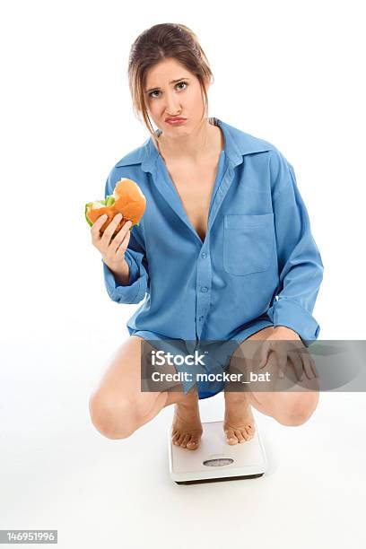 Woman Cannot Understand Why She Gaining Weight Stock Photo - Download Image Now - Dieting, 20-24 Years, 20-29 Years