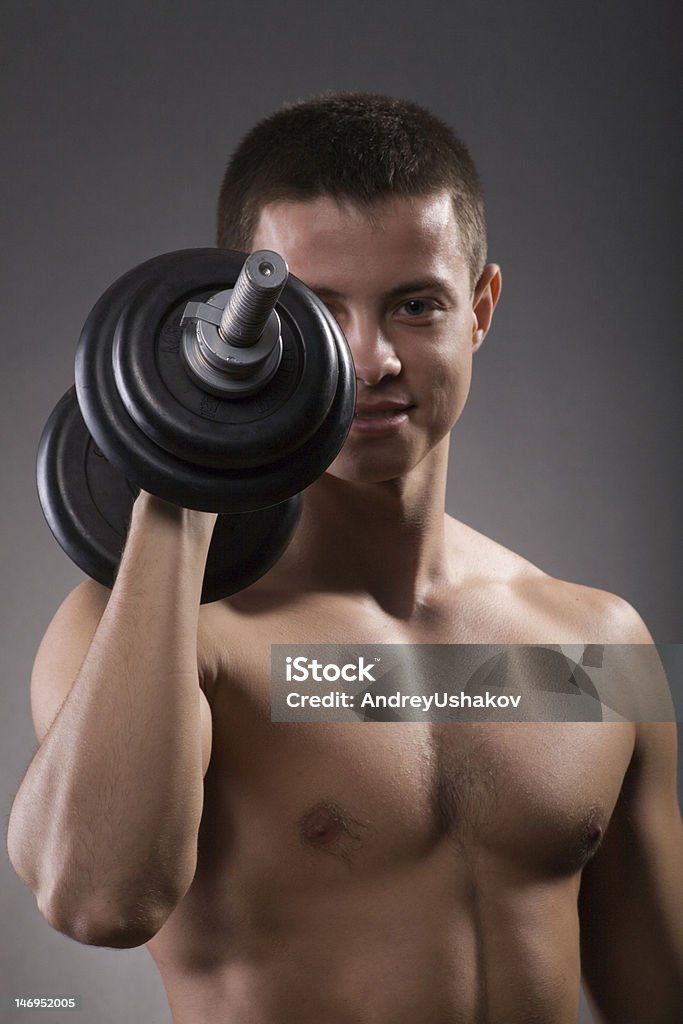 Hombre joven deporte con pesa - Foto de stock de Actividad libre de derechos