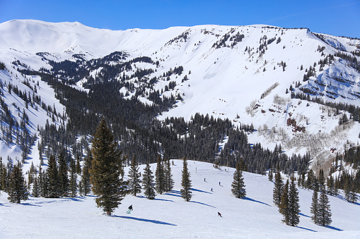 Photo of ski slope at Sun Valley Ski resort in Idaho during March.  March signals the end of the ski season unless there is a large late snowfall that could extend the season.  There is still enough snow to cover the run.