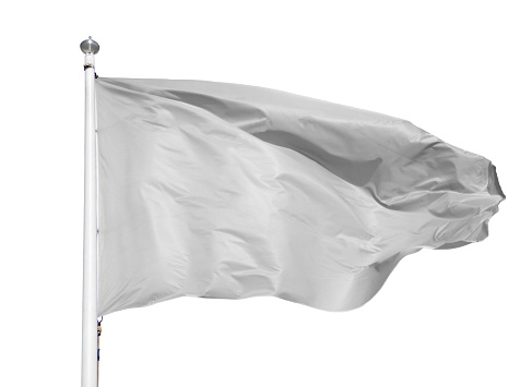 Close up of white flag on flagpole flying in the wind isolated on white and copy space