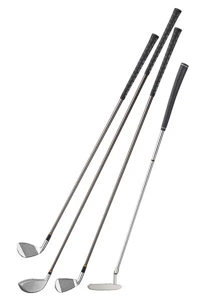 four different type of golf clubs, isolated