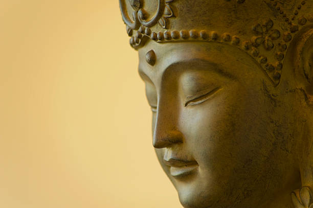 Profile of Buddha face stock photo