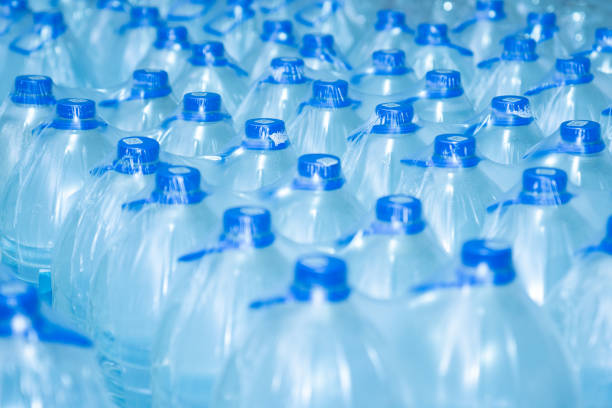 istock Water bottles close up. Lots of plastic bottles. 1469528622