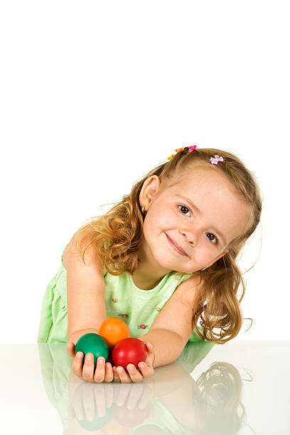 istock Adorable little girl with easter eggs - isolated 146952975