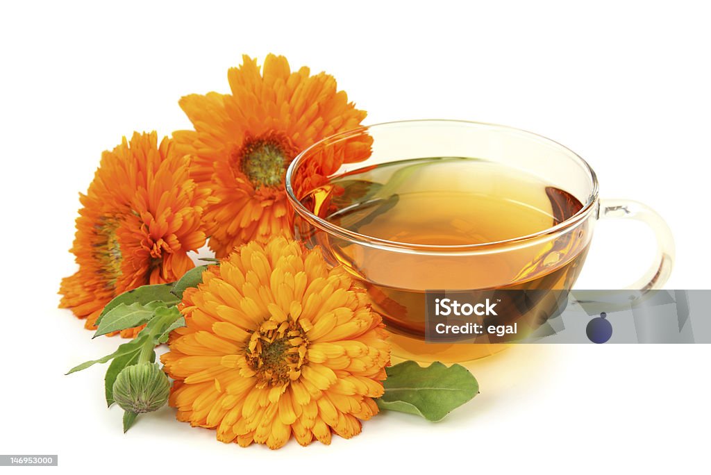 Herbal calendula tea Herbal calendula tea isolated on white background Alternative Medicine Stock Photo