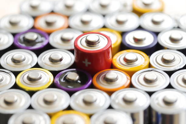 istock many round batteries and one red battery 1469530330