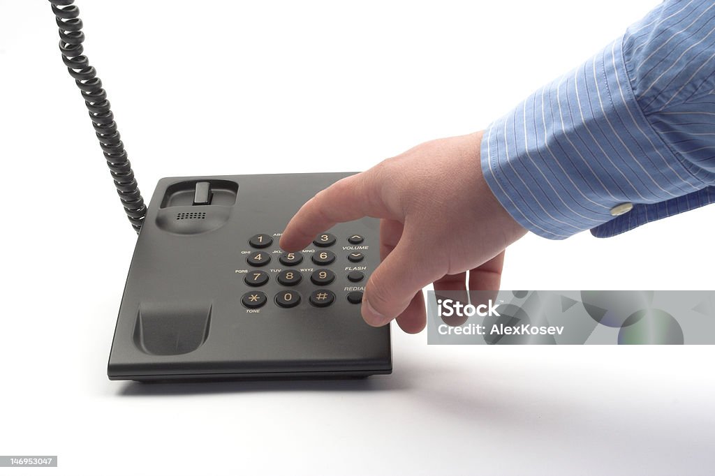 dial dial with a black office telephone over white Communication Stock Photo