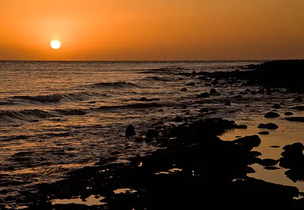 Sunset over a rocky beach at Puerto Penasco (Rocky Point) Mexico