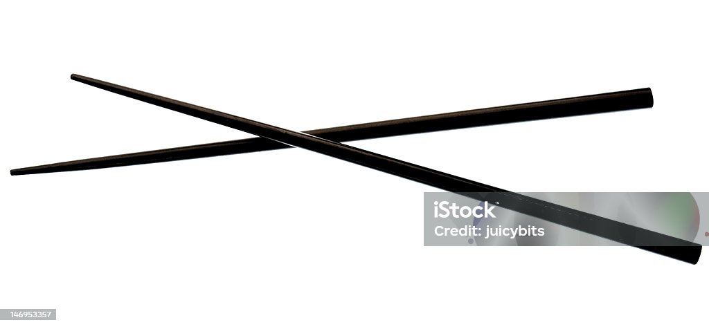 chopsticks in black color isolated on white background Black Color Stock Photo