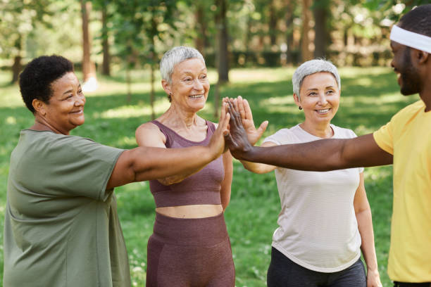 istock Active senior women high five with trainer after enjoying outdoor workout 1469533761