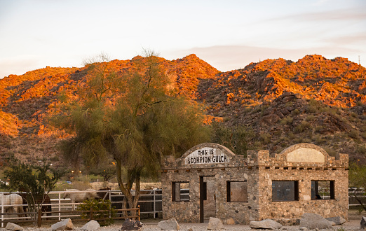In Phoenix, USA the ruins at Scorpion Gulch can be seen agains the backdrop of Sunset Mountain as dusk approaches.