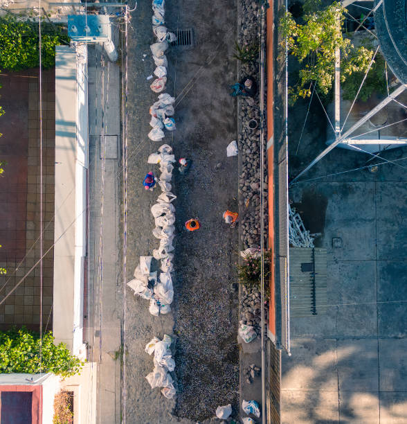 istock Repairing stone paved road aerial view 1469539700
