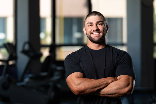 istock Handsome Man Posing In Black T-shirt 1469540334