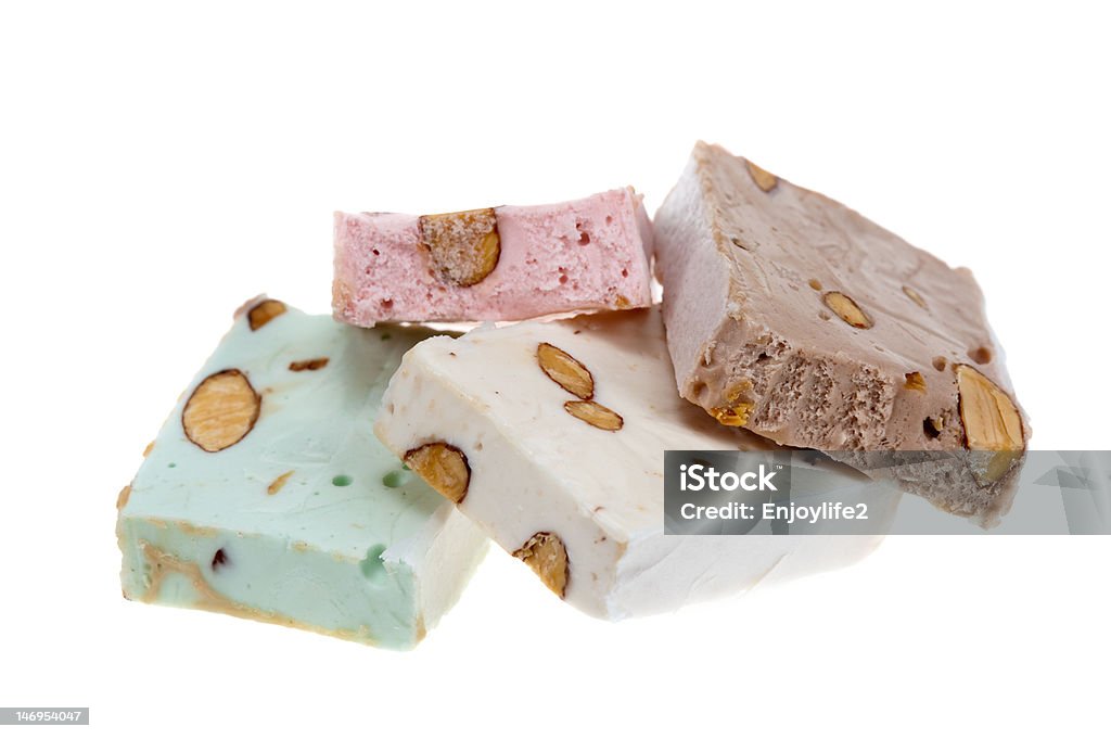 delicious nougat delicious nougat isolated on a white background Almond Stock Photo