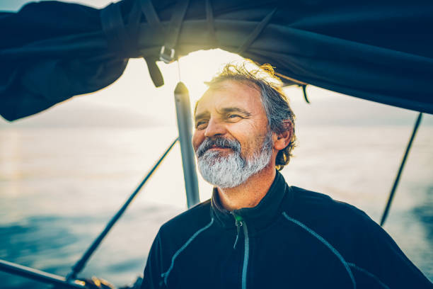 istock Skipper sailing on sailboat 1469543360