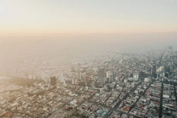 Areal shot of Mexico City at sunrise around the city center.