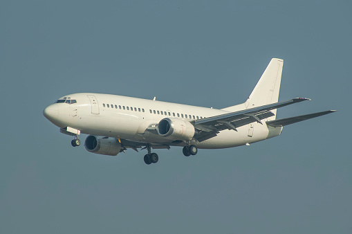 Düsseldorf, Germany - March 10, 2011: A white Boeing 737 shortly before Touch down