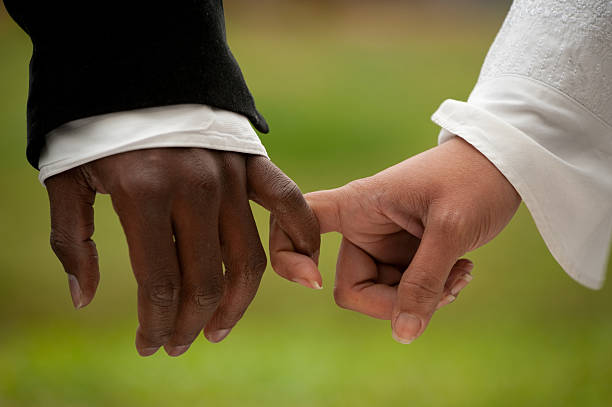 Holding Hands stock photo