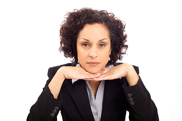 Attractive business woman thinking stock photo